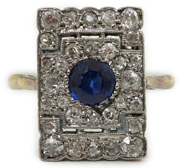 An early 20th century 18ct and platinum, millegrain set sapphire and diamond cluster tablet ring